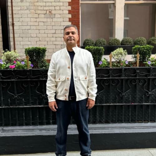 Cover for Who is Darshan Hiranandani and what is his professional background?